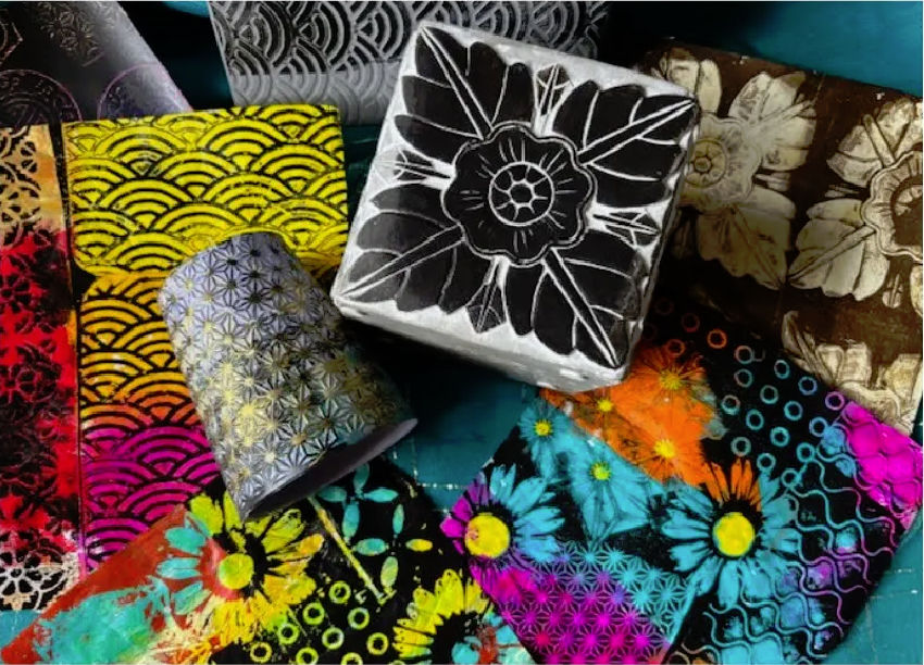 Several Gelli Plate prints made using thrift store items